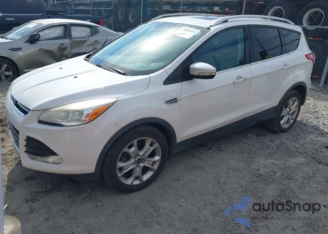 2016 Ford Escape Titanium из США, поврежденный, VIN 1FMCU0J93GUB03300